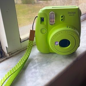 Green Instax mini 9, it’s new used just two or three times.